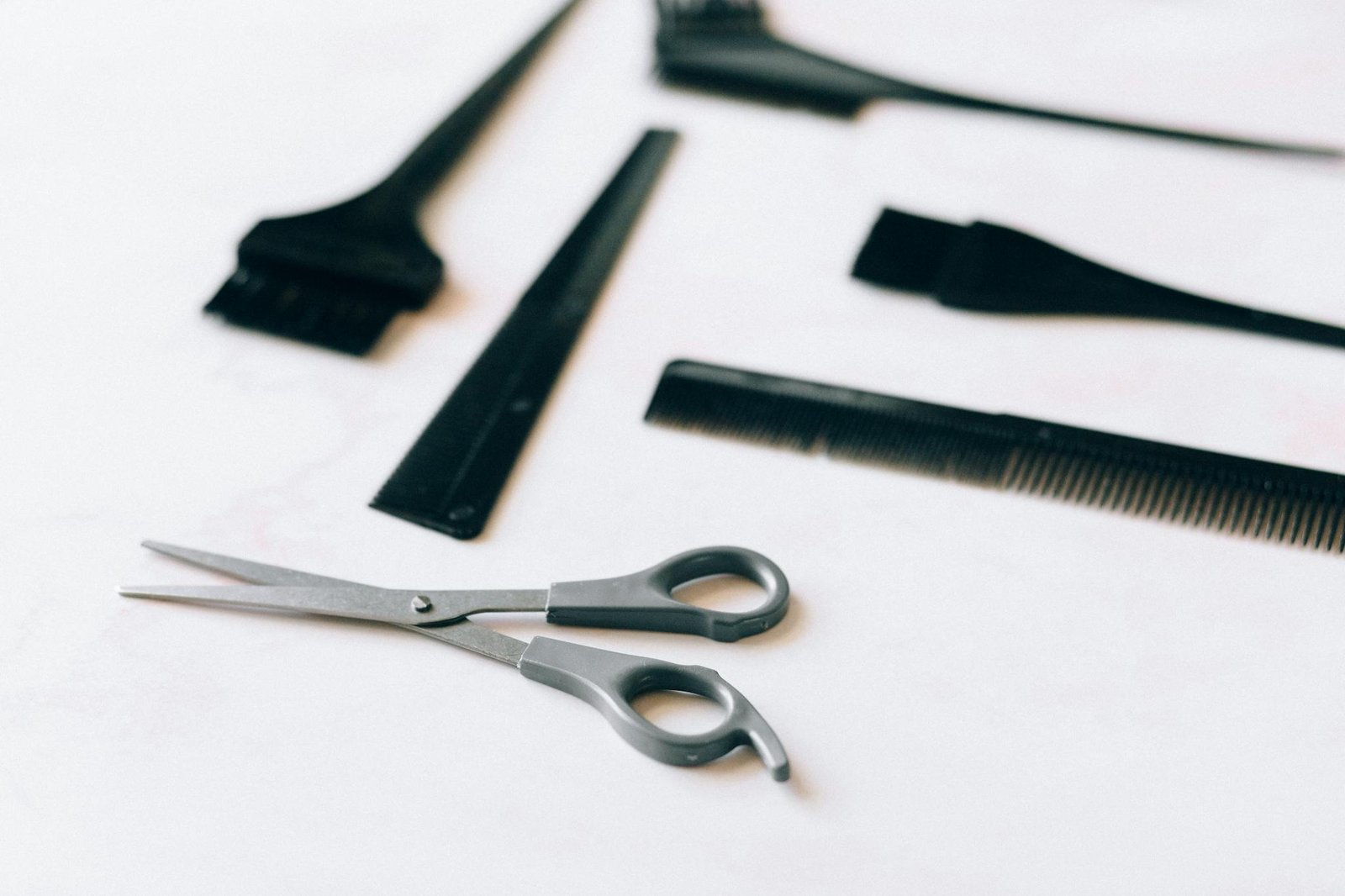 Black Handled Scissors Beside Stainless Steel Scissors